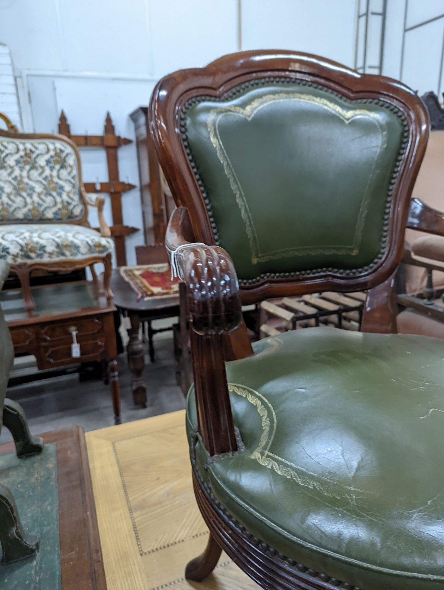 A Victorian style mahogany and green leather swivel desk chair, width 60cm, depth 50cm, height 96cm